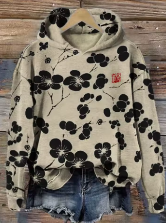 Lightweight oversized soft knit hoodie named Anna by Christine Brewer, featuring a cozy design and relaxed fit.