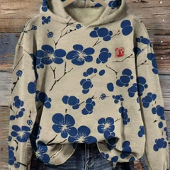 Soft knit hoodie by Christine Brewer, oversized and cozy with a lightweight design, shown in a relaxed fit with a hood and long sleeves.