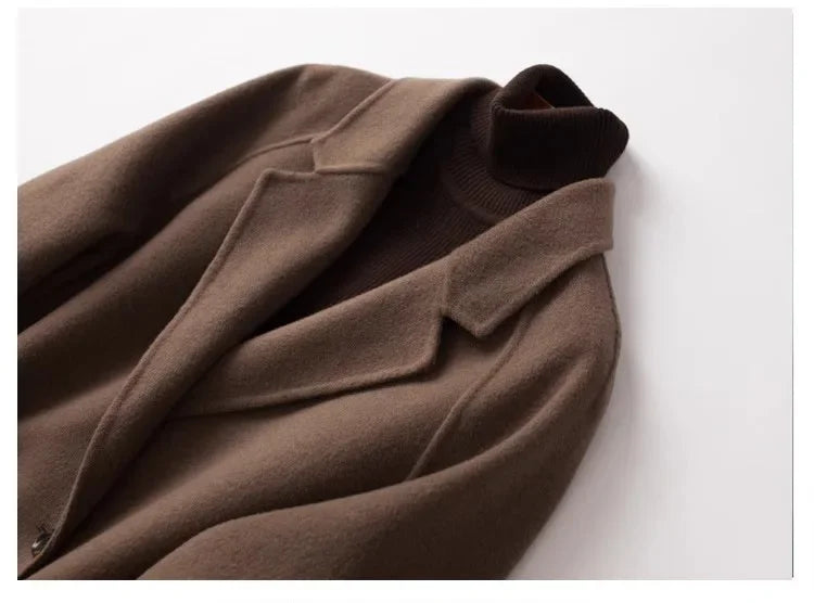 Brown double-breasted wool coat for women by Christine Brewer, featuring a tailored fit and classic design.