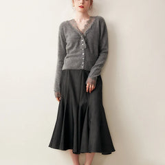Elsa cashmere cardigan for women by Christine Brewer, soft beige knit with front buttons and long sleeves, cozy and stylish.