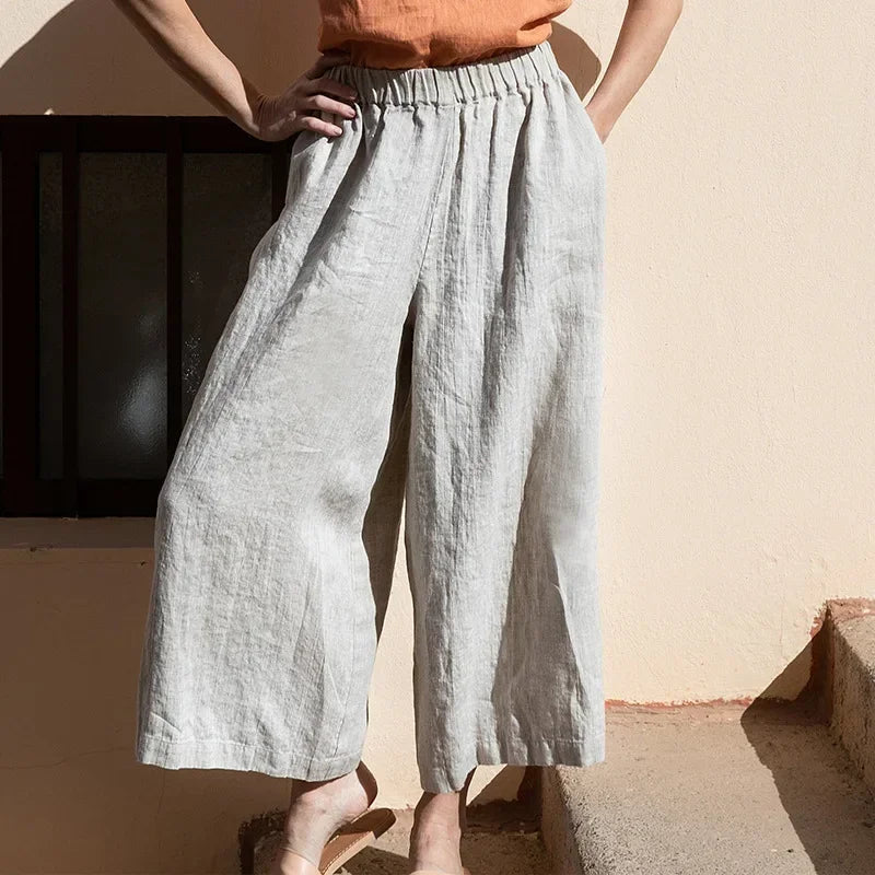 Linen cropped wide-leg drawstring trousers for women, loose pull-on pants by Christine Brewer, casual and comfortable fit.