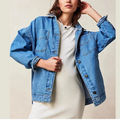 Charlotte oversized denim shirt jacket for women by Christine Brewer, featuring classic blue denim with button front and collar.