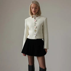 Everleigh cropped button-front women's jacket by Christine Brewer, showing a stylish, fitted design with front buttons and collar.