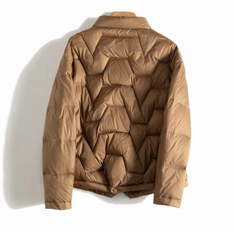 Women's Aurora short quilted puffer jacket by Christine Brewer, featuring lightweight insulation and a stylish, padded design.
