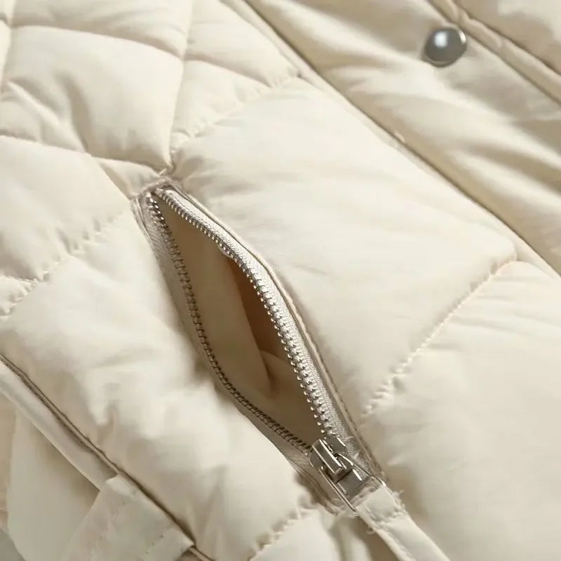 Ruby stand collar puffer vest for women by Christine Brewer, featuring a quilted design and front zipper closure.