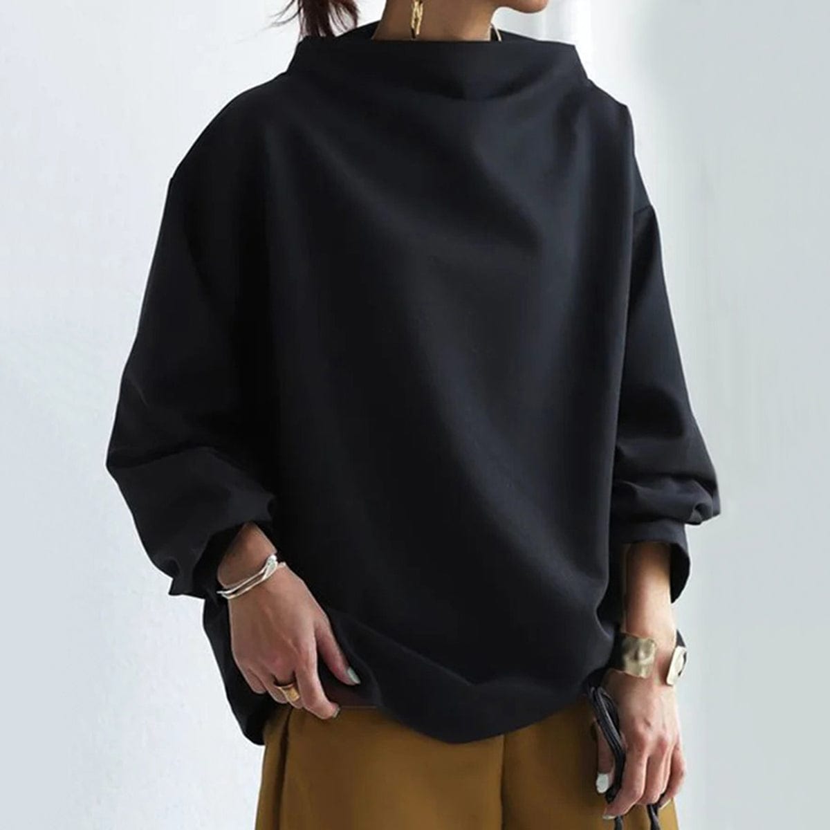 Christine Brewer Isabella soft knit high neck top in a versatile, sophisticated design with a high neckline and smooth fabric.
