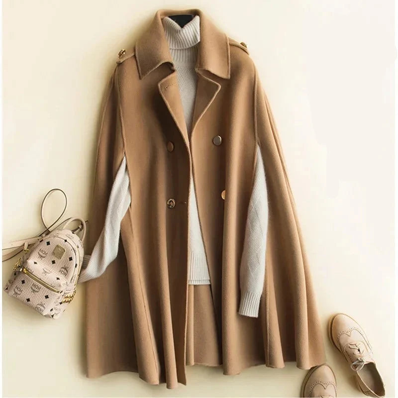 Elegant women's cape coat by Christine Brewer featuring Ivy design, stylish and sophisticated outerwear for chilly days.