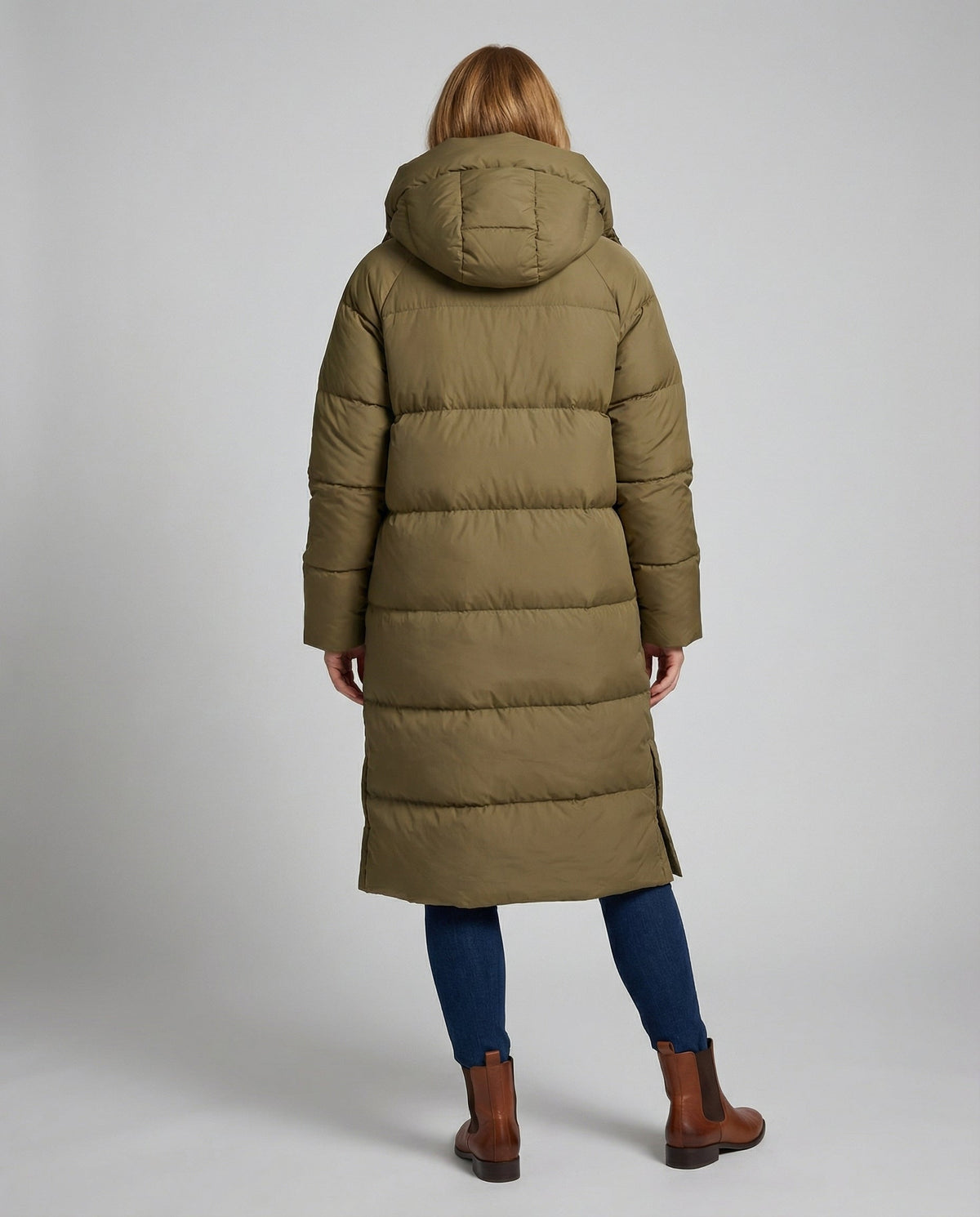 Back view of Christine Brewer Julia long puffer jacket for women, warm and stylish with a quilted design and high collar.
