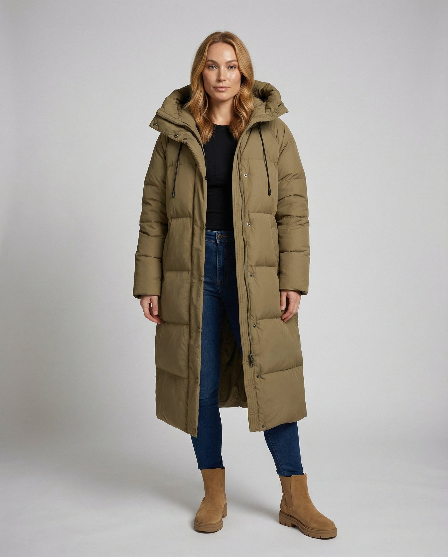 Full-body front view of Christine Brewer Julia long puffer jacket for women, showcasing its quilted design and high collar.