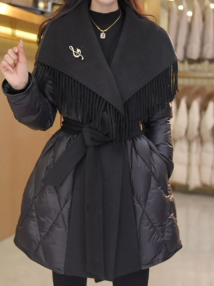 Christine Brewer Stella belted quilted puffer jacket for women, shown in a stylish, warm quilted puffer coat with belt detail.