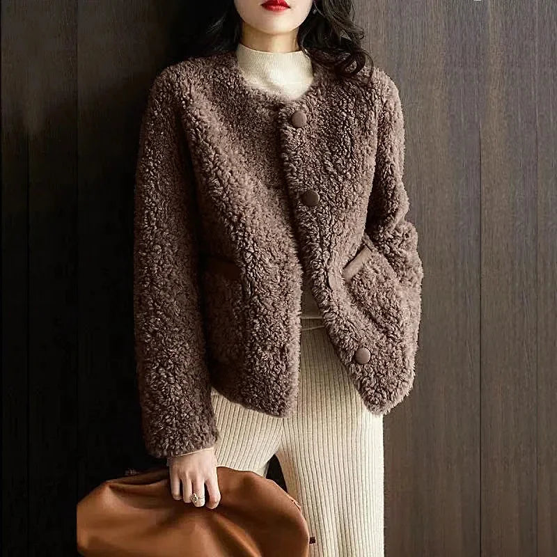 Emily glamorous faux fur coat for women by Christine Brewer, showcasing a luxurious, plush fur exterior and stylish design.