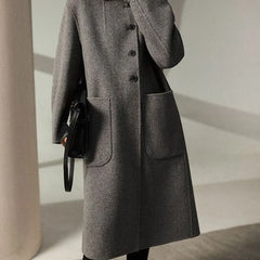 Green wool coat for women, long Lucy coat by Christine Brewer, featuring a tailored fit and classic design.