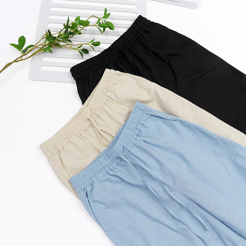 Women’s cotton linen wide-leg drawstring trousers by Christine Brewer, loose pull-on pants with a relaxed fit and comfortable style.