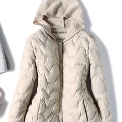 Women’s quilted puffer jacket with hood by Christine Brewer, featuring a stylish quilted design and warm insulation.