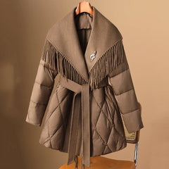 Christine Brewer Stella belted quilted puffer jacket for women, featuring a stylish quilted design and adjustable belt for warmth and fashion.