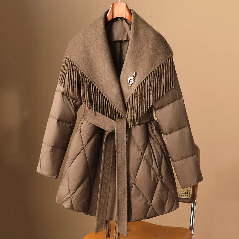 Christine Brewer Stella belted quilted puffer jacket for women, featuring a stylish quilted design and adjustable belt for warmth and fashion.