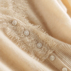 Elsa cashmere cardigan for women by Christine Brewer, soft, beige knit with a relaxed fit and button closure.