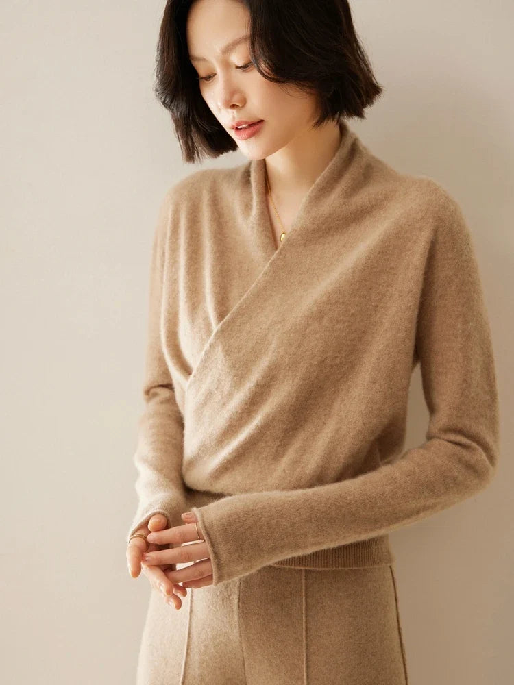 Woman wearing a beige Christine Brewer Dawn cashmere sweater, showcasing its soft, luxurious knit and relaxed fit.