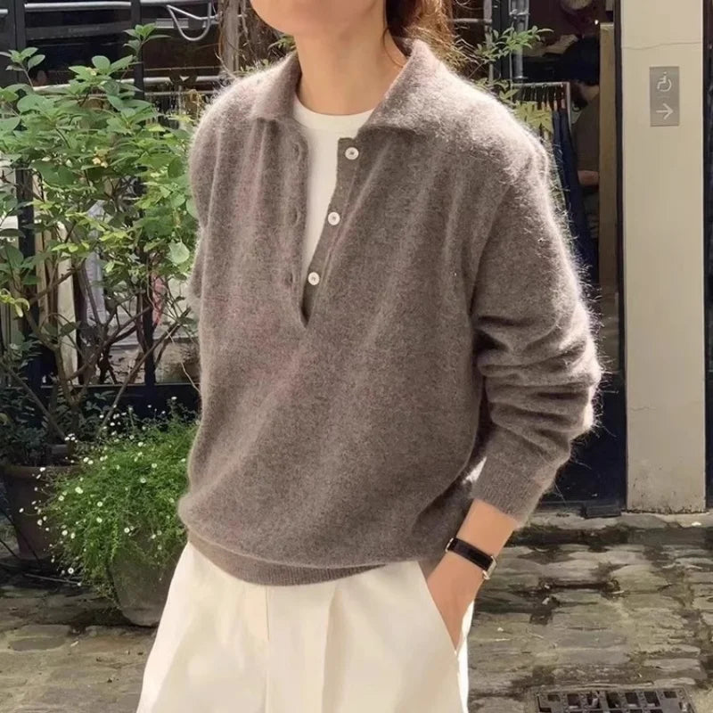 Women’s wool hoodie sweater by Christine Brewer featuring a cozy, stylish hoodie design in soft wool fabric.