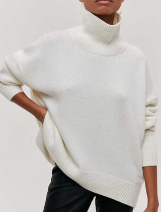 Iris women's turtleneck sweater in autumn style, featuring cozy knit fabric and a fitted design by Christine Brewer.