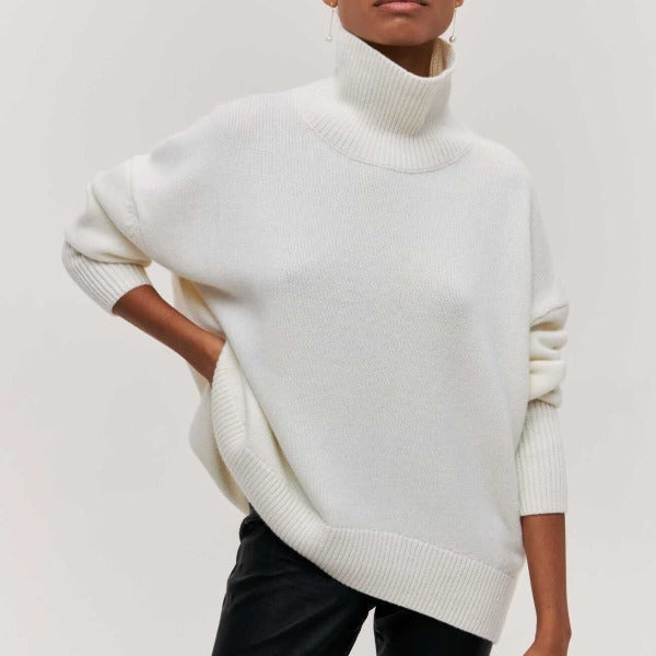 Iris women's turtleneck sweater in autumn style, featuring cozy knit fabric and a fitted design by Christine Brewer.