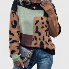 Heather leopard print graphic sweater for women by Christine Brewer, showing the cozy knit with bold leopard pattern.