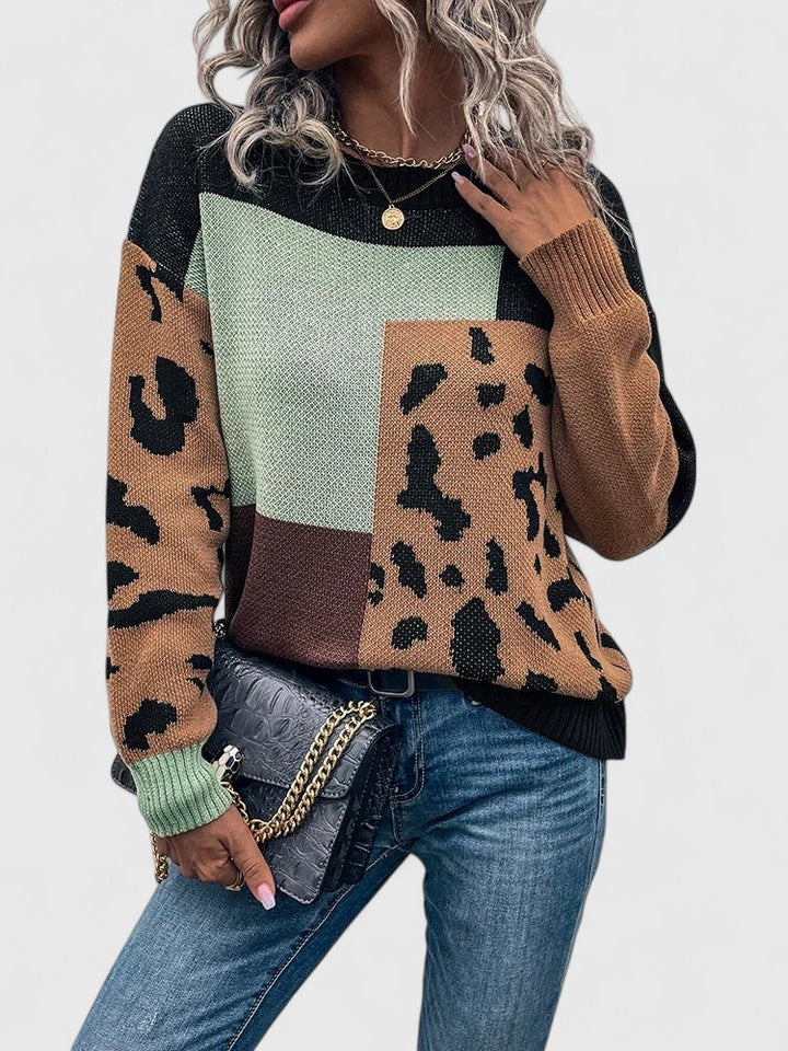 Heather leopard print graphic sweater for women by Christine Brewer, showing the cozy knit with bold leopard pattern.