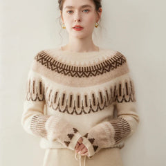 Women’s cashmere crew neck sweater by Christine Brewer, featuring a soft, cozy knit in a classic style.