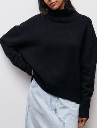 Iris women's turtleneck sweater by Christine Brewer in autumn colors, featuring a cozy fit and ribbed neckline.