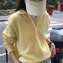 Christine Brewer women's wool hoodie sweater in soft, cozy wool fabric, featuring a relaxed fit and hood for casual comfort.