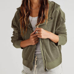 Mia cropped hooded hoodie for women by Christine Brewer, featuring a relaxed fit and drawstring hood in soft fabric.
