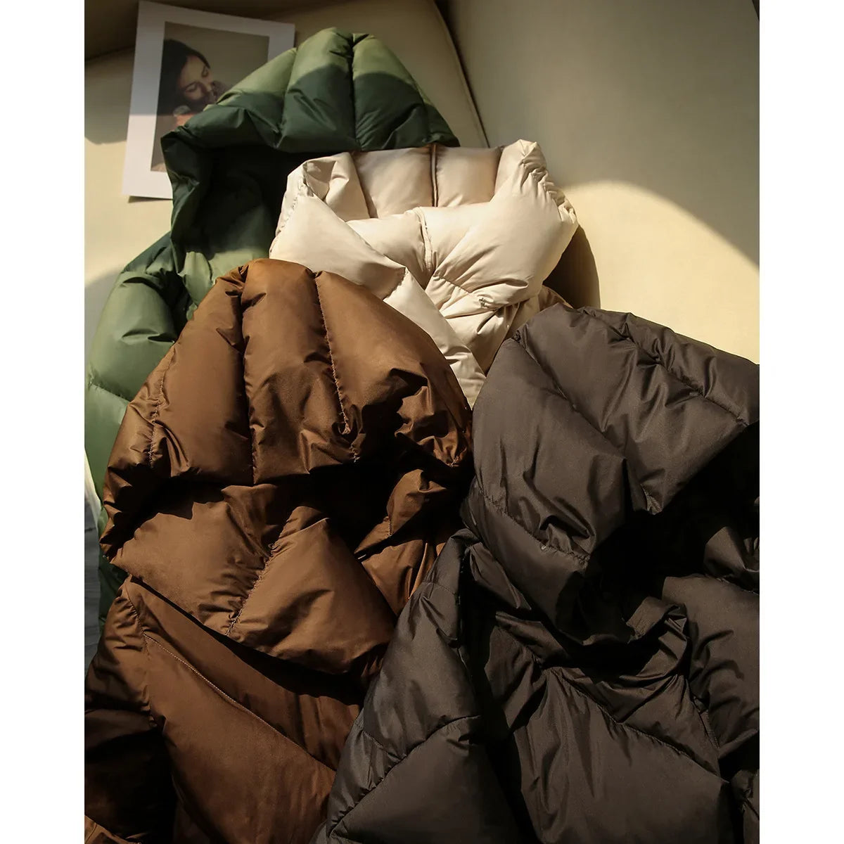 Christine Brewer Grace cropped hooded puffer jacket for women, showcasing the sleek, insulated design with a hood and quilted texture.
