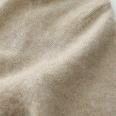Helen cashmere sweater for women by Christine Brewer, soft beige knit with a relaxed fit and ribbed cuffs.