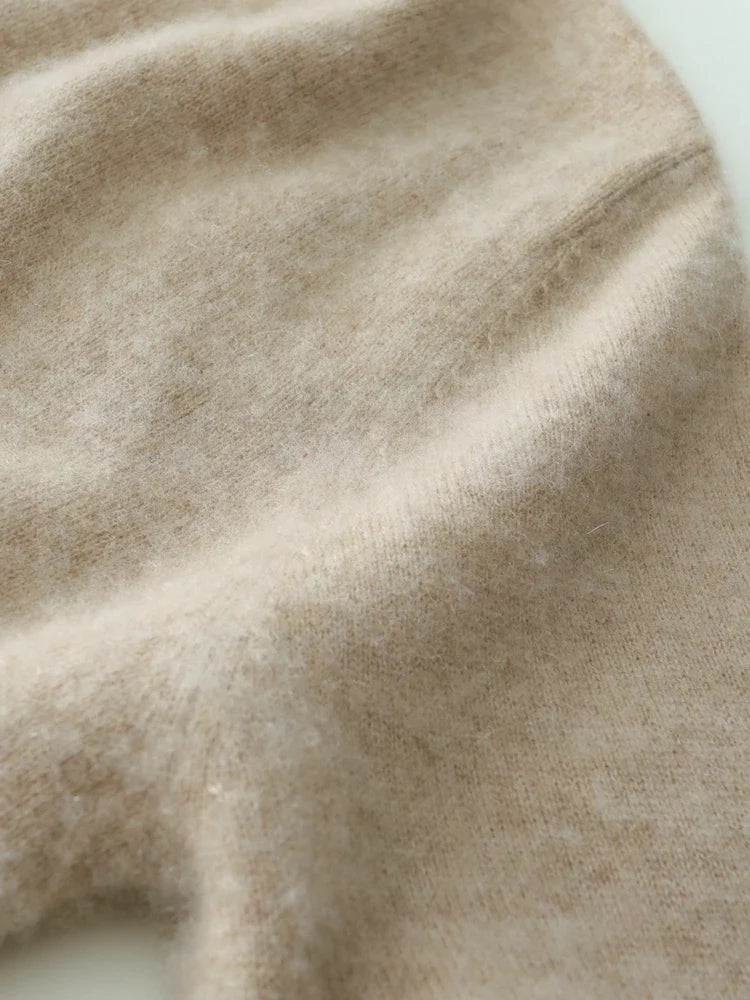 Helen cashmere sweater for women by Christine Brewer, soft beige knit with a relaxed fit and ribbed cuffs.