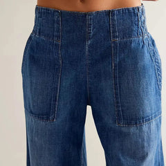 Blue denim wide-leg women's jeans by Christine Brewer, relaxed fit casual pants featuring a stylish, comfortable design.
