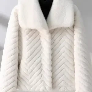 Women's short faux fur coat by Christine Brewer, featuring a plush, stylish navy blue design with a smooth, soft texture.