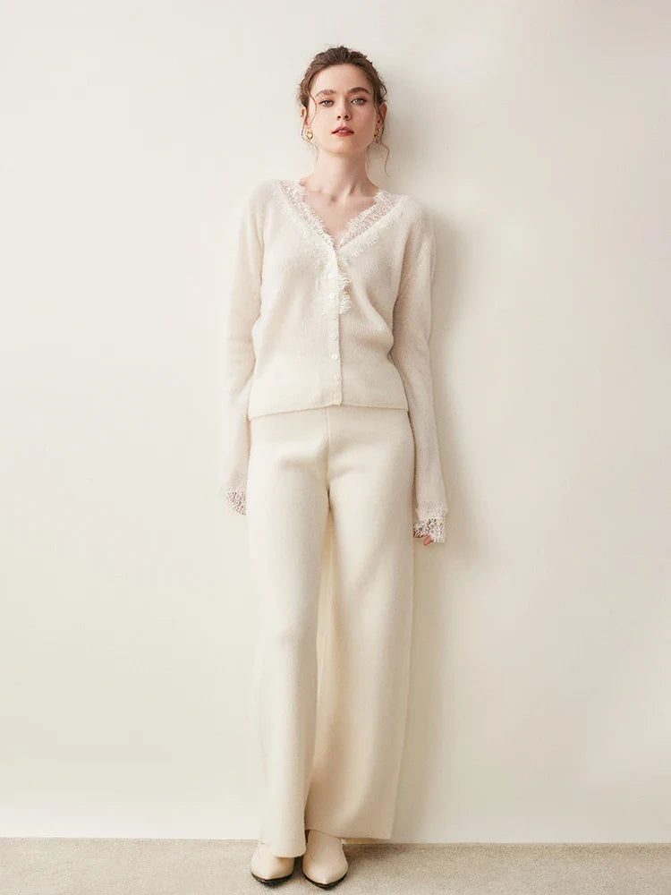 Elsa cashmere cardigan for women by Christine Brewer, soft beige knit with button details and ribbed cuffs.