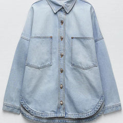 Women’s relaxed denim shirt jacket by Christine Brewer, featuring classic blue denim, button-up front, and casual fit.