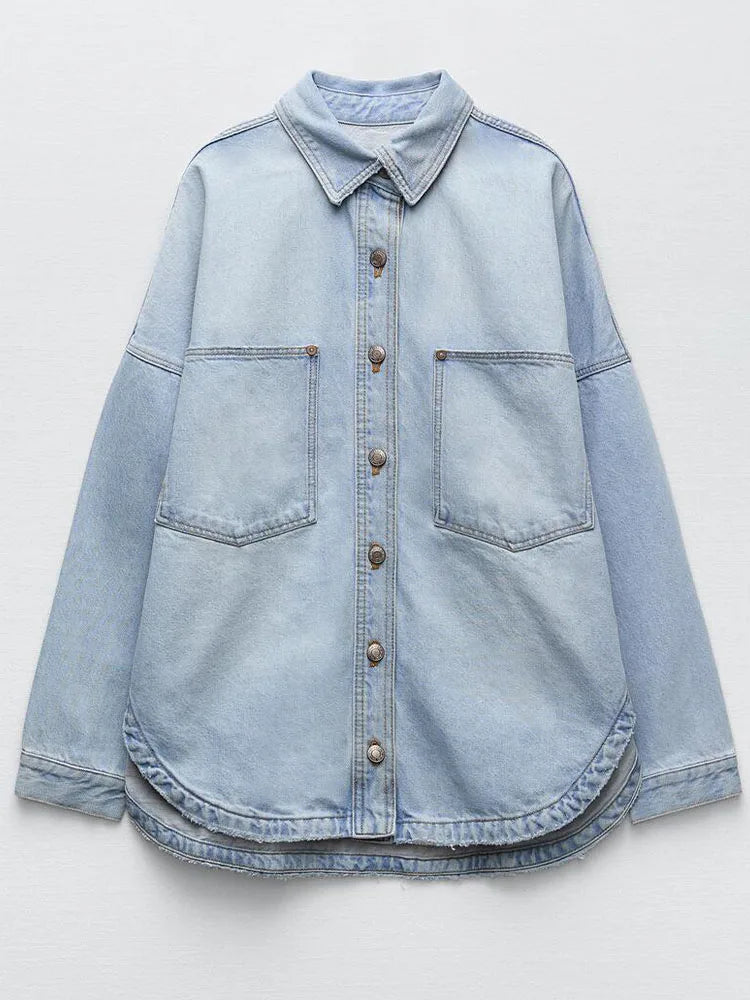 Women’s relaxed denim shirt jacket by Christine Brewer, featuring classic blue denim, button-up front, and casual fit.