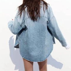 Christine Brewer Nora relaxed denim shirt jacket for women, shown in light blue with button-front and rolled cuffs.