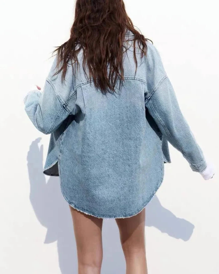 Christine Brewer Nora relaxed denim shirt jacket for women, shown in light blue with button-front and rolled cuffs.