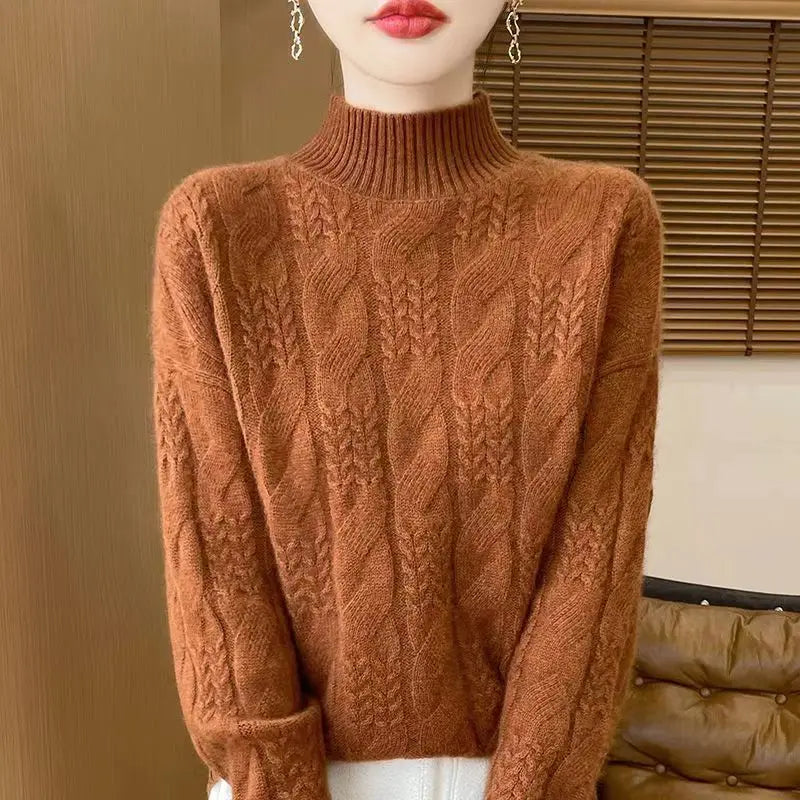 Cream-colored Janet cashmere cable knit sweater for women by Christine Brewer, featuring textured knit pattern and cozy fit.