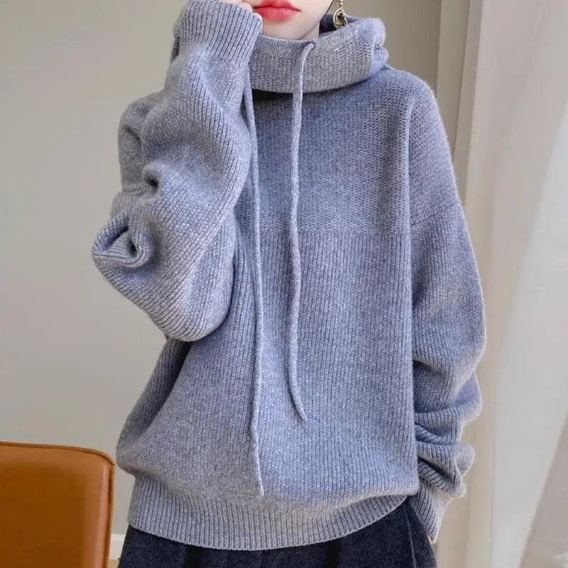 Fern ribbed hoodie for women by Christine Brewer, featuring a cozy, textured fabric with a relaxed fit and ribbed details.