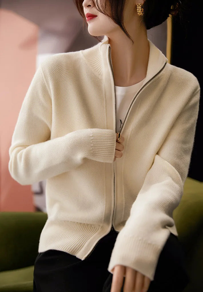 Women's wool zip-up cardigan by Christine Brewer featuring a classic jean-inspired design with a front zipper and cozy fit.
