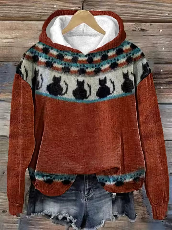 Christine Brewer Rosie cozy lightweight oversized soft knit hoodie displayed on a model with relaxed fit and soft fabric texture.