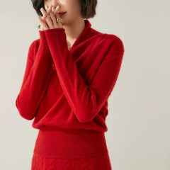 Women's Dawn cashmere sweater by Christine Brewer, showcasing soft beige fabric and cozy fit.