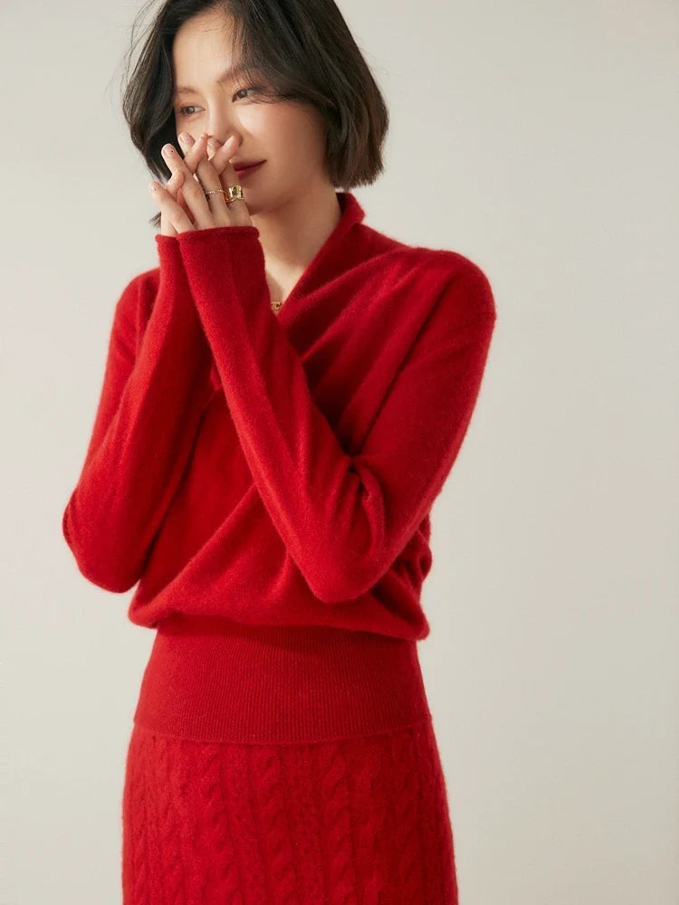 Women's Dawn cashmere sweater by Christine Brewer, showcasing soft beige fabric and cozy fit.