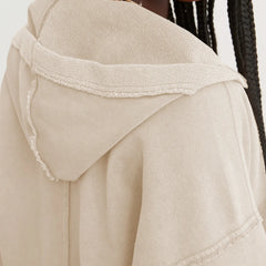 Christine Brewer Eleanor women's cropped hoodie with long sleeves and a relaxed fit, shown in a stylish casual wear setting.