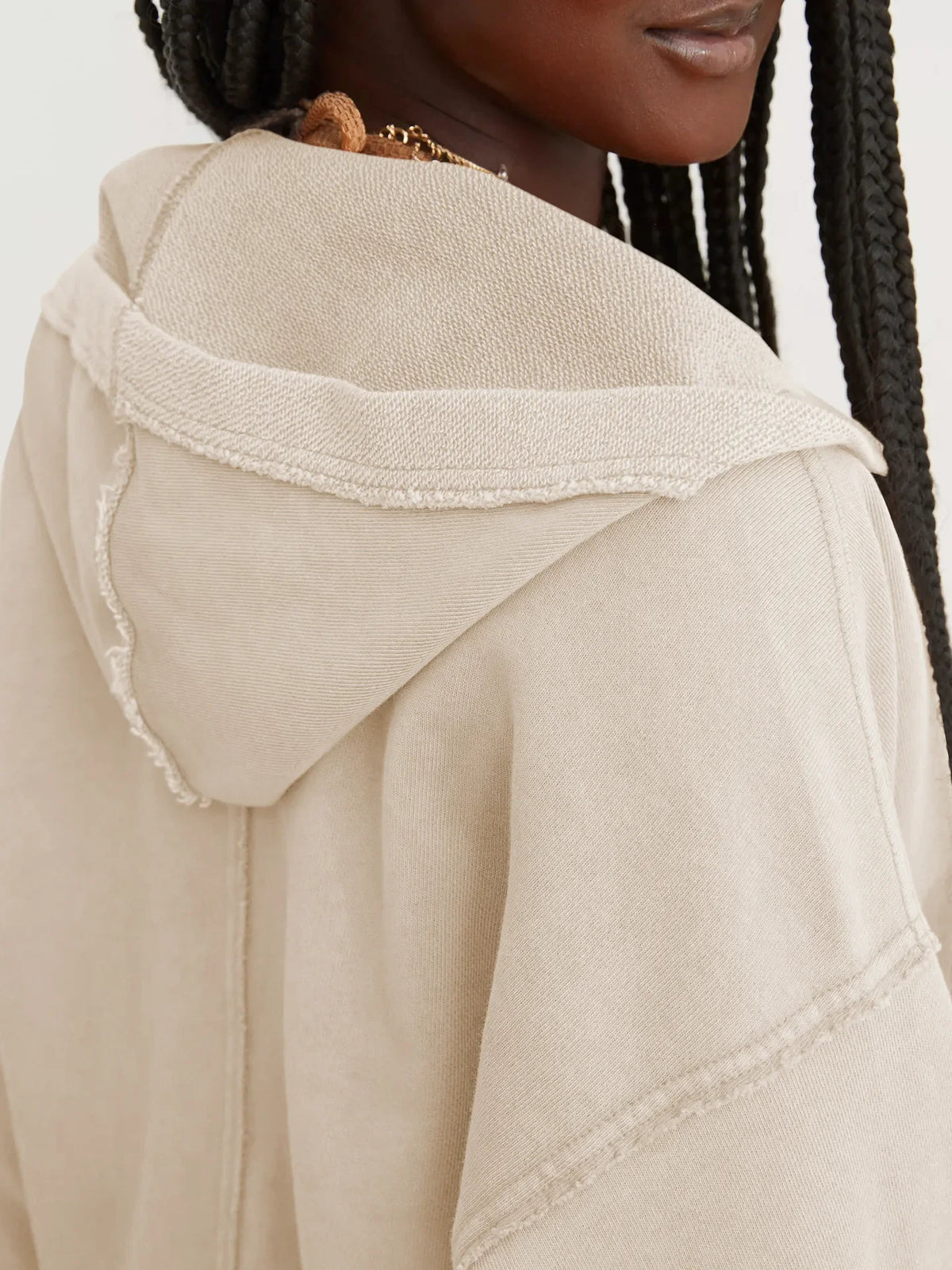 Christine Brewer Eleanor women's cropped hoodie with long sleeves and a relaxed fit, shown in a stylish casual wear setting.
