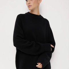 Christine Brewer Flora oversized wool sweater for women, showcasing a cozy, chunky knit in soft, neutral tones.